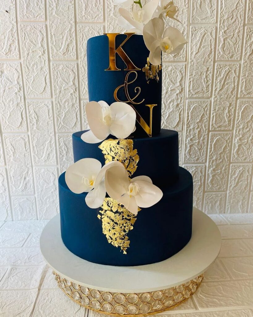 Navy Blue and Gold Initial and Floral Wedding Cake